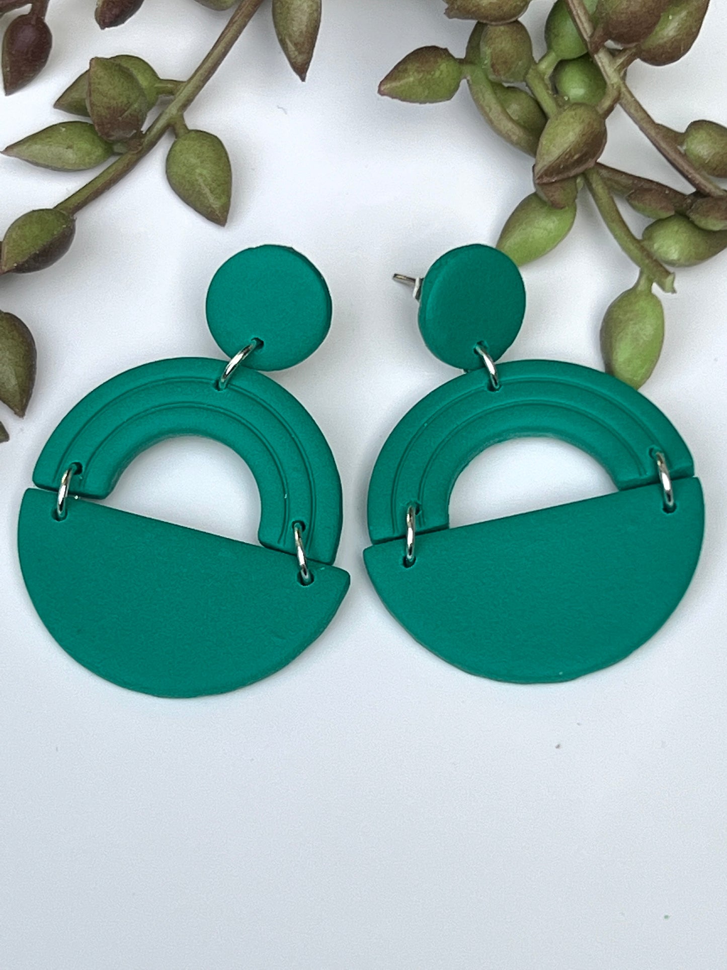 Green embossed earrings with elegant semi-circle and arch design for everyday crafted with polymer clay and stainless steel