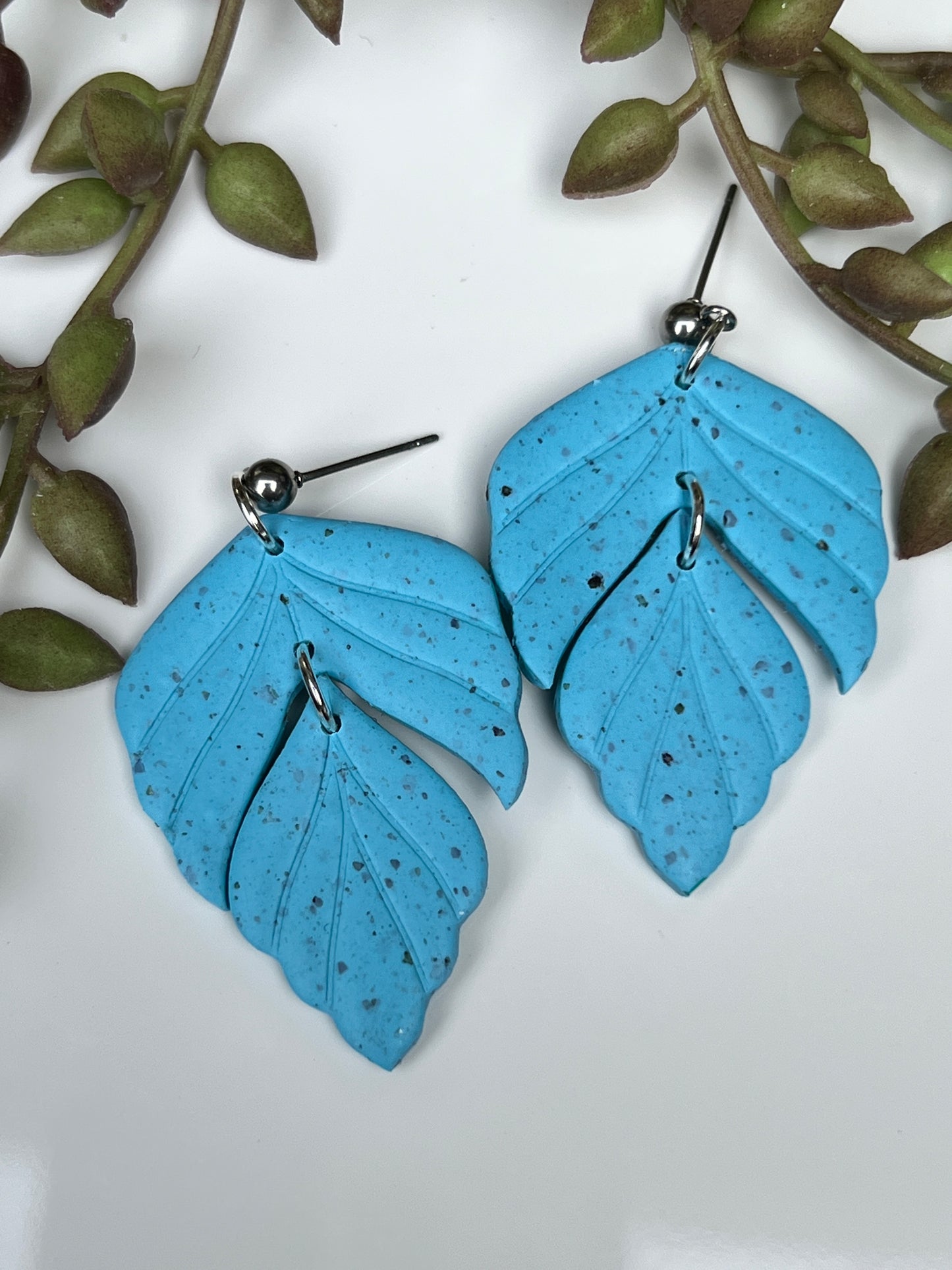 Spotted Blue dangle earrings with segmented feathered design for everyday made from polymer clay & stainless steel findings